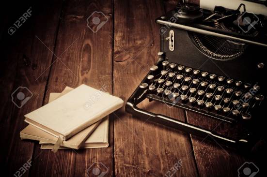 20569499-vintage-typewriter-and-old-books-touch-up-in-retro-style